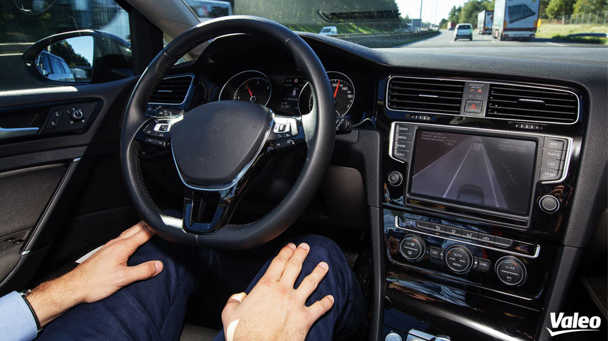 A man testing an autonomous car