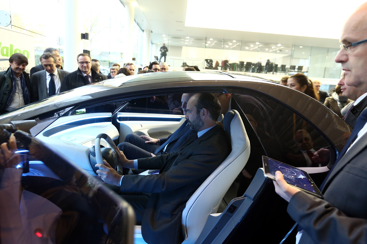 Prime Minister Edouard Philippe at a Valeo stand at an event