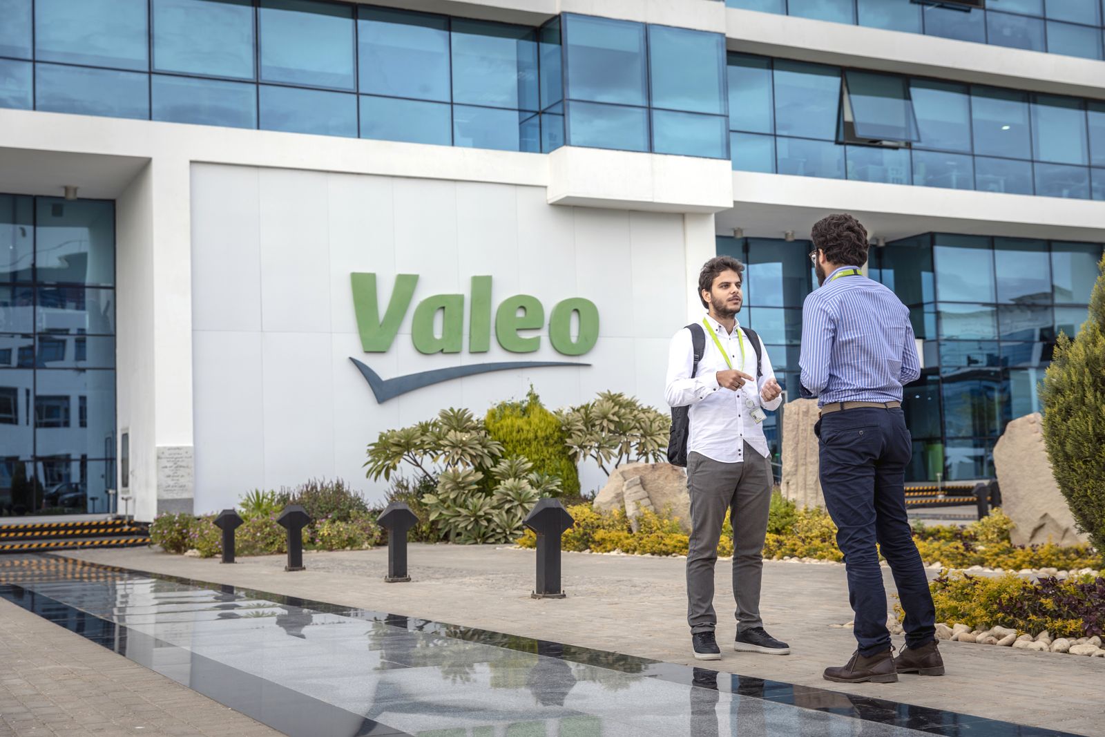 two Valeo workers outside of Egypt plant in Cairo