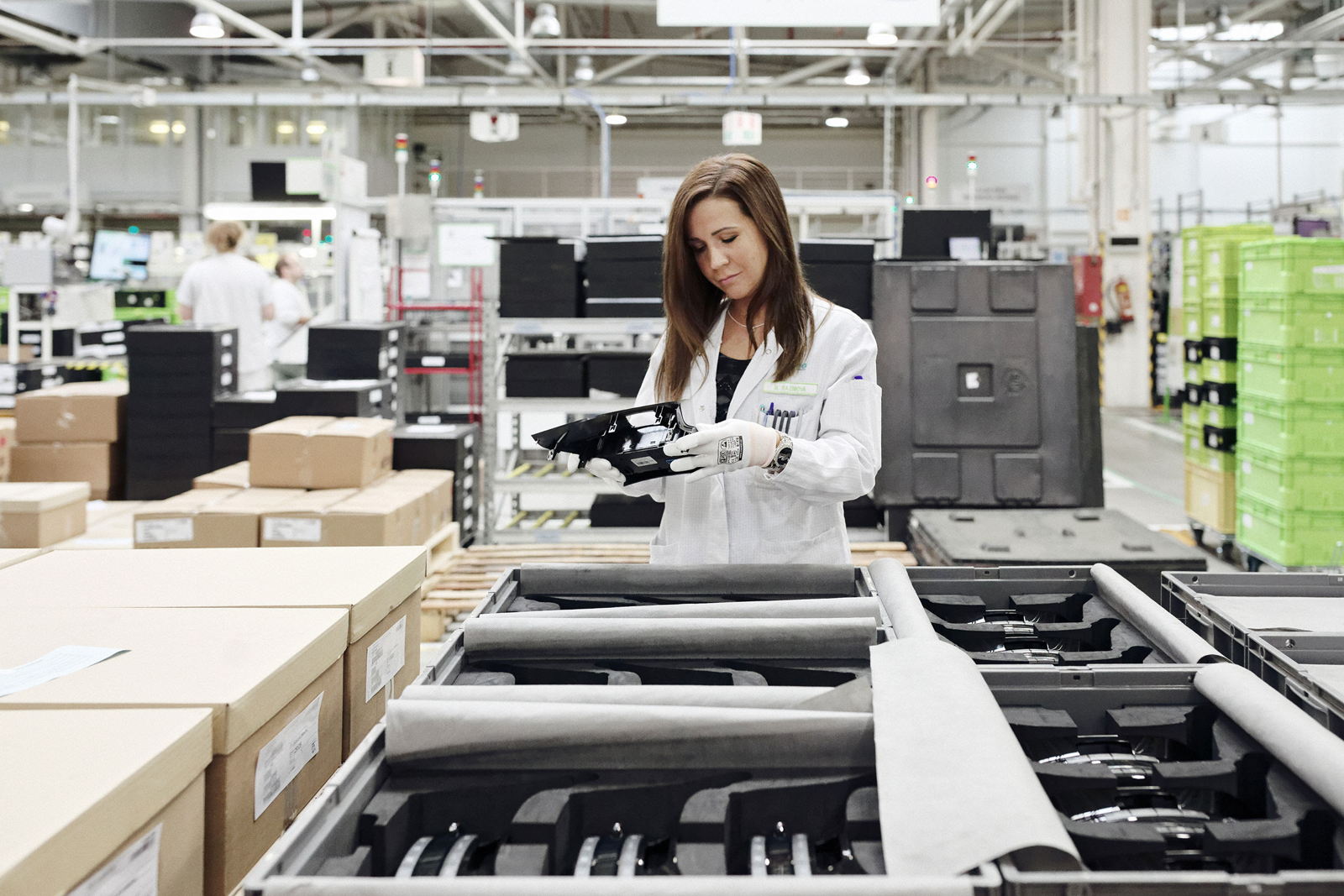 Woman inspecting a product